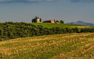 Rural landscape of valleys in summer in the province of siena in tuscany italy