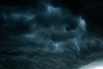 Wall Mural - black cloud and thunderstorm before rainy, dramatic black clouds and dark sky