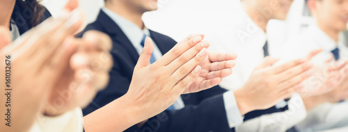 Fotografía Group of business people clapping their hands at the meeting