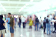 © sutichak - crowd people traveler in airport terminal, image blur used background