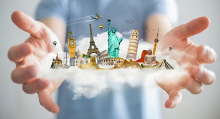 Wall Mural - businessman holding a cloud full of famous monuments in his hands 3d rendering