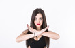 © Garrincha - girl gesturing x with arms crossed