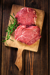 Wall Mural - Fresh raw beef steak sirloin with rosemary