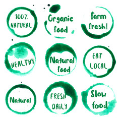 Wall Mural - Organic Food collection of round watercolor stains with natural, 100%, eat local, farm fresh, organic food, healthy, fresh daily, slow text. Set of vector Organic Food stamps.