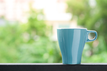 Coffee mug with nature background.