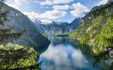 Lake Koenigsee with many tourist boats seen from the rabensteinwand, Berchtesgaden, Bavaria, Germany