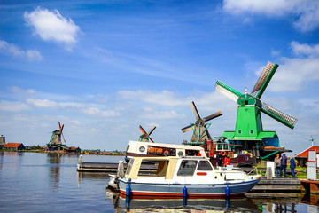 Canvas Print - Beautiful landscape with windmills, river and boats