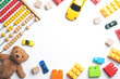 Kids toys frame on white background. Top view. Flat lay