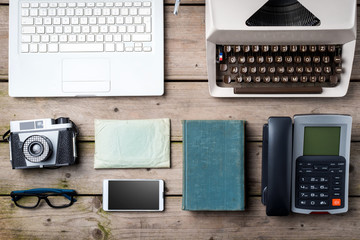 Technology progress, old and modern digital devices on wooden table