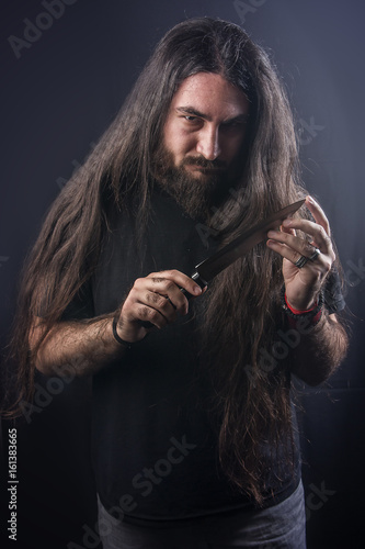 Crazy Metalhead Long Haired Man Shaking His Head And Waving His