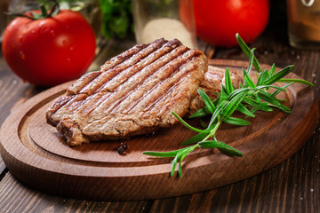 Wall Mural - Succulent portions of grilled fillet mignon served with rosemary