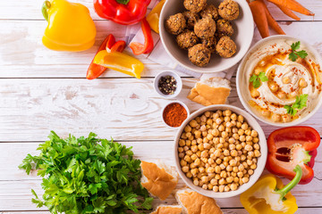 Wall Mural - Falafel, pita, hummus and chickpea  with vegetables. Top view