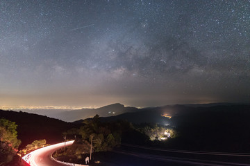 Wall Mural - beautiful sky with many stars above the mountain , milky way band across the sky.