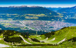view from above of Innsbruck city with alpes mountain range, Natural path and Cable car take from Nordkette mountain
