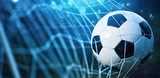 Fototapeta  - Soccer ball in goal