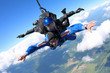 © Sky Antonio - Tandem skydiving in the blue sky