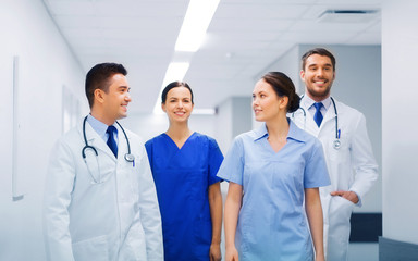 Fototapete - happy group of medics or doctors at hospital