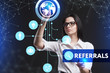 © photon_photo - The concept of business, technology, the Internet and the network. A young entrepreneur working on a virtual screen of the future and sees the inscription: Referrals