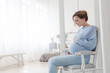 © demphoto - Pregnant woman sitting in chair