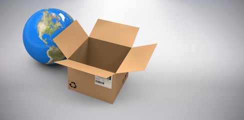 Wall Mural - composite image of 3d image of globe by empty cardboard box