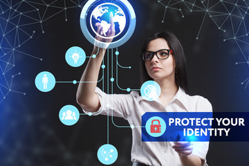 The concept of business, technology, the Internet and the network. A young entrepreneur working on a virtual screen of the future and sees the inscription: Protect your identity