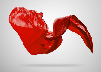 Smooth elegant red cloth on grey background