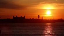 Ellis Island Sunset: Breathtaking Orange Glow Of Sunset At America's Iconic Immigration Landmark