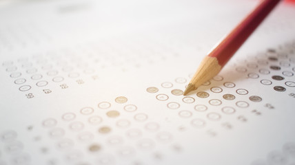 Wall Mural - optical form of an examination with pencil and, filling a standardized exam test form in school,