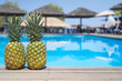 Pineapples by the pool in the beachbar. Food and drink concept. Holidays and summer.