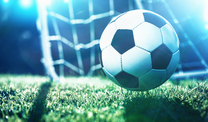 Soccer ball on the field of stadium