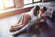 Couple having sex on floor