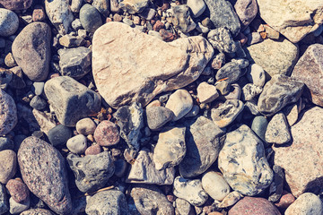 Wall Mural - Pebble stones, background. Beach on the Rugen Island.