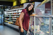 © Rido - Young woman shopping food