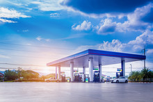 Gas Station With Clouds And Blue Sky