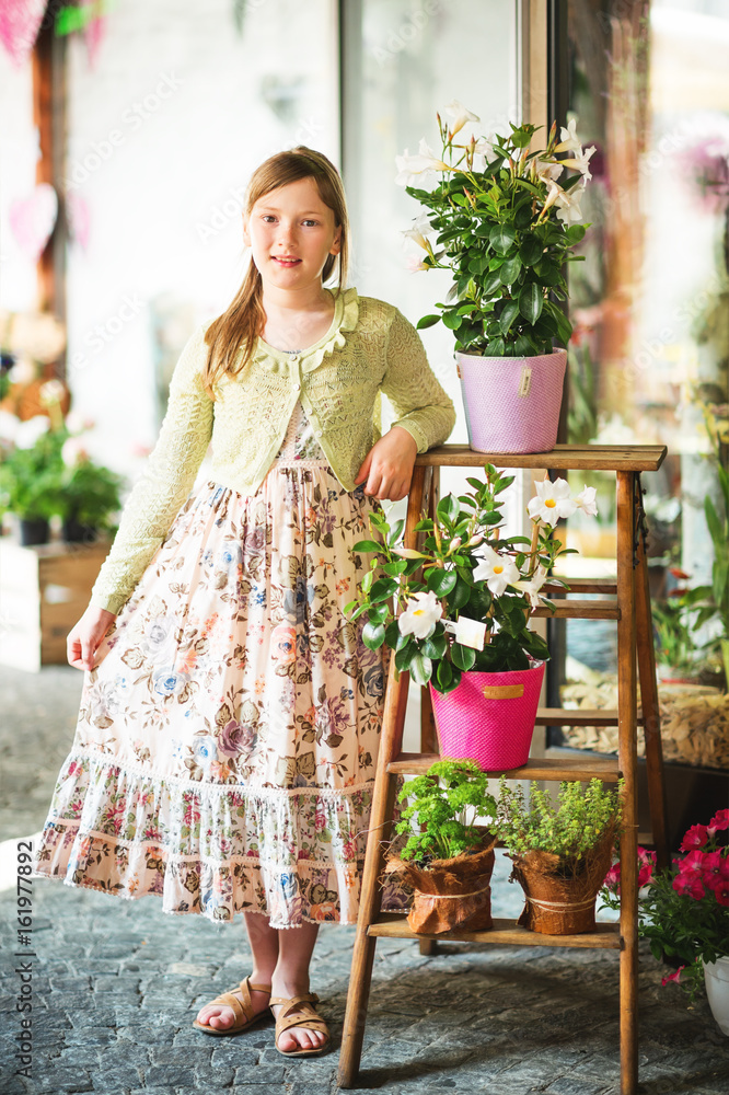 Outdoor portrait of pretty 9-10 year old girl, wearing long summer dress Stock Photo | Adobe Stock Outdoor portrait of pretty 9-10 year old girl, wearing long summer dress Stock Photo | Adobe Stock