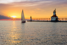 St. Joseph Lighthouses And Sailboat Solstice Sundown - St. Joseph, Michigan On Lake Michigan
