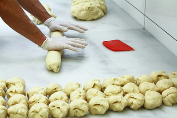 Cook hands preparing dough for homemade pastry