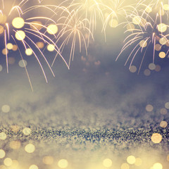 Vintage Gold and blue Fireworks and bokeh in New Year eve and copy space. Abstract background holiday.