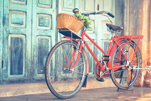 Hipster Red Bicycle In Old Building Walls Background , Color If Vintage Tone 