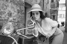 BW Photography Of A Beautiful Tourist Woman. Italian Holiday Concept