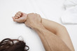 A hairy man's hand holding a woman hand for rape and sexual abuse concept