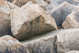 Fototapeta Tęcza - Granite boulders in hurricane barrier