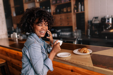 Poster - Laughing man making a phone call in cafe