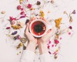 © Simonforstock - Female hands holding organic tea and herbs