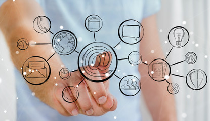 Businessman touching multimedia hand-drawn interface
