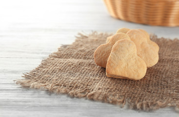 Poster - Butter cookies in shape of heart on wooden table