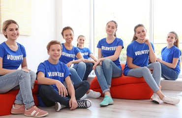 Poster - Meeting of young volunteers team indoors