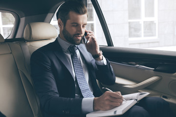 Young business man test drive new car