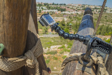 Action Camera On Stick On Climbing Tower