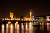 Fototapeta Big Ben - A long exposure shot of the Big Ben and Westminster Palace at night in London, England, UK